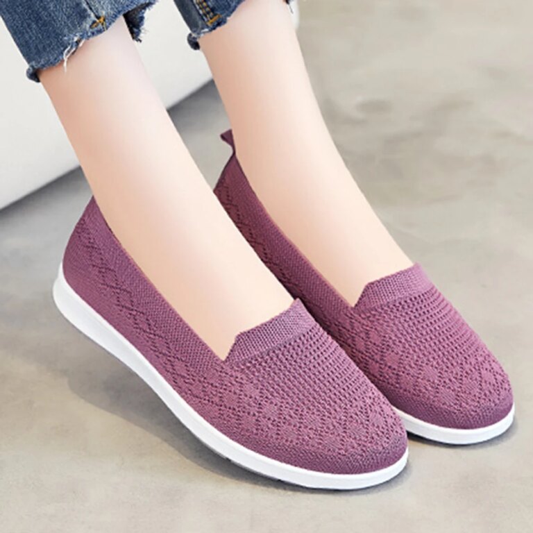 Pair of breathable summer sneakers in a stylish woven design, perfect for casual wear and outdoor activities