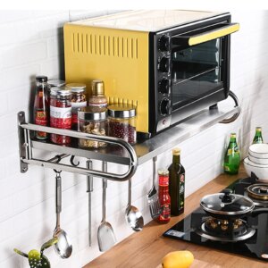 Stainless steel wall-mounted microwave oven rack for kitchen storage with heavy-duty shelf for microwave, cookware, spices, and appliances.