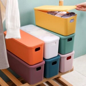 Narrow desktop storage box with lid for organizing household items