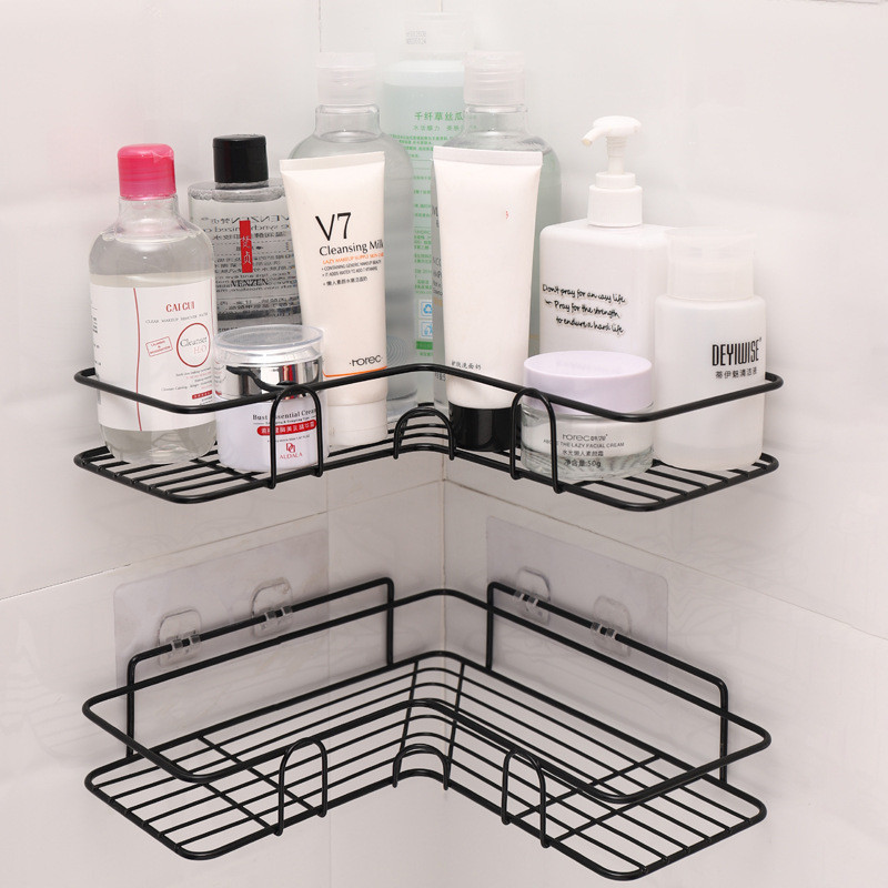 Corner shower shelf in black with protective guardrails.